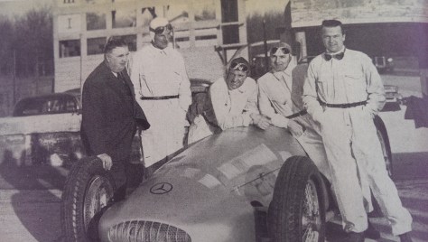It's the late summer of 1939: In three months the world would be at war, and German dominance of grand prix racing would come to an end. Here they are the last Mercedes drivers -- Neubauer, Seaman (a week away from his fatal smash at Spa), von Brauchitsch, and Rudi Caracciola...