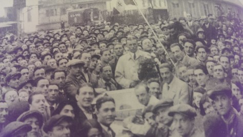 Varzi wins the Mille Miglie and is carried through the streets of Galliate.
