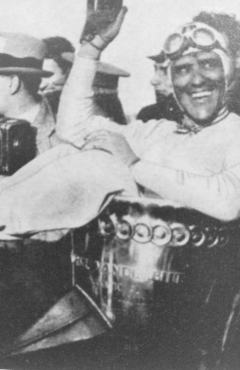 Everything is bigger in America, even the Vanderbilt Cup which Nuvolari wins and sits in!